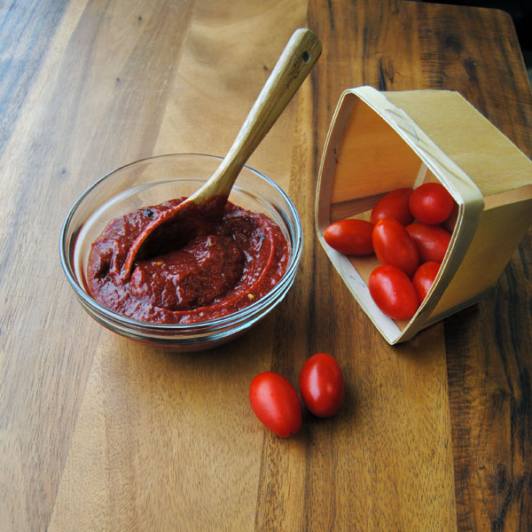 Blueberry Chipotle Ketchup with a Tomato Strainer